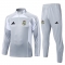 Chandal de Sudadera del Real Madrid Nino 25-26 Gris Blanco Chandal de Sudadera del Real Madrid Nino 25-26 Gris Blanco